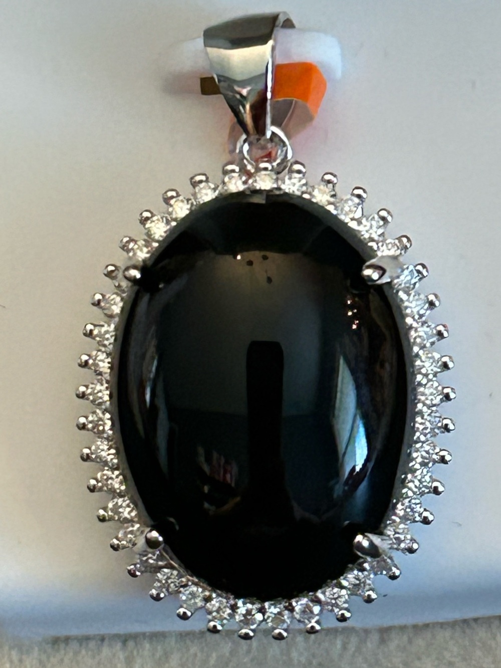 0.80CTW Moissanite Halo Around a Natural Oval Black Onyx Pendant Sterling Silver